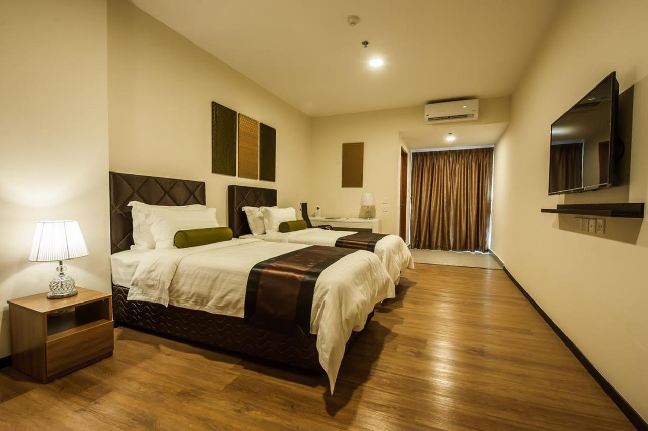 Aman Hills Hotel Kampong Timbunan Kültér fotó